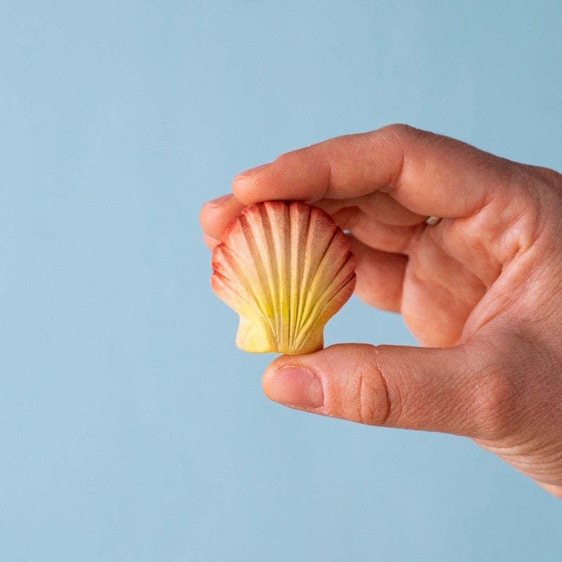 Bumbu Toys Orange Seashell at Milk Tooth Australia