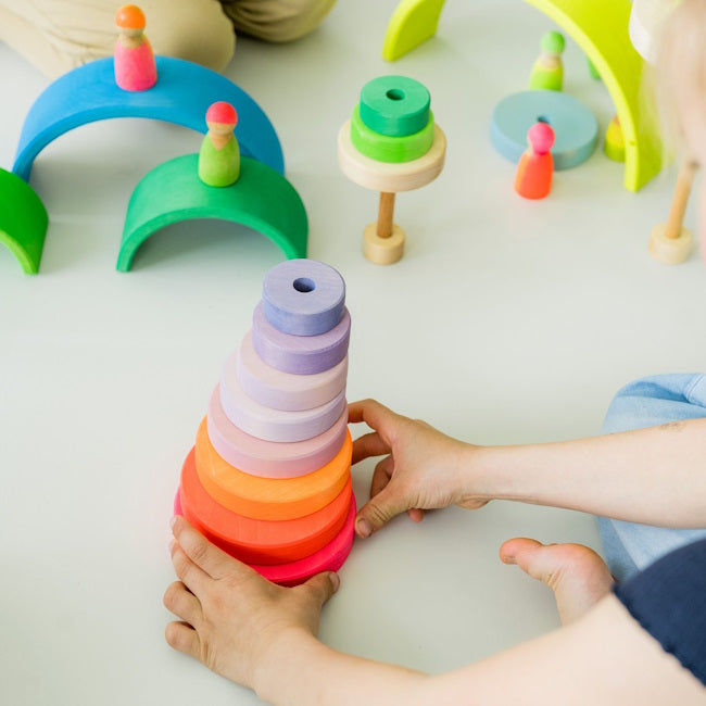 Grimm's | Conical Stacking Tower Neon Pink at Milk Tooth