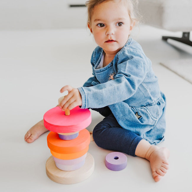 Grimm's | Conical Stacking Tower Neon Pink at Milk Tooth
