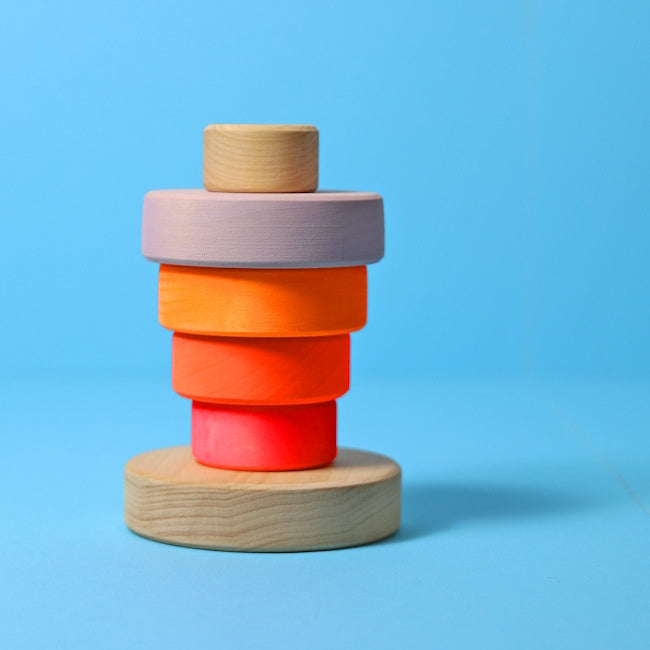 Grimm's | Small Conical Stacking Tower Neon Pink at Milk Tooth
