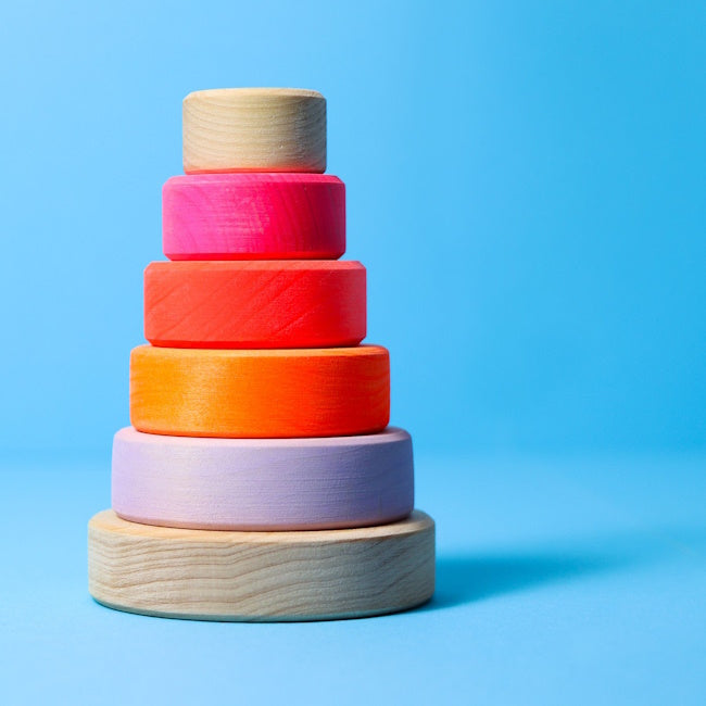 Grimm's | Small Conical Stacking Tower Neon Pink at Milk Tooth