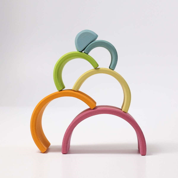 Grimm's | Medium Rainbow Pastel wooden stacking toy at Milk Tooth