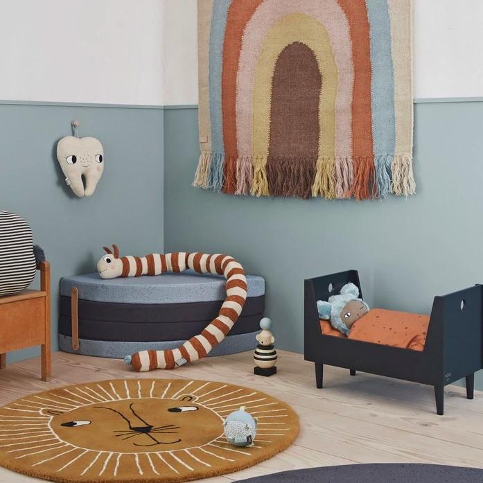 OYOY Living Design Follow the Rainbow Wall Rug styled in kids room with Lion Floor Rug