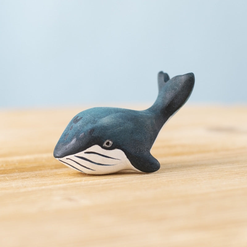 Bumbu Toys Baby Blue Whale wooden figurine at Milk Tooth Australia