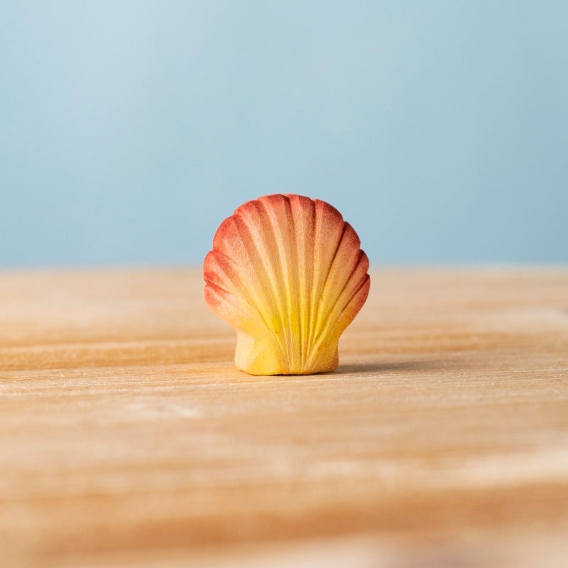 Bumbu Toys Orange Seashell at Milk Tooth Australia