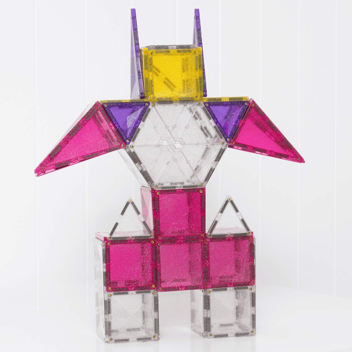 Colorful geometric robot model made from Connetix glitter tiles on a white background