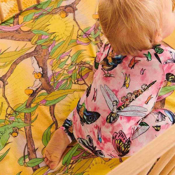 Kip and Co x May Gibbs | Flannelette Baby Fitted Sheet Sunrise Delight at Milk Tooth Australia