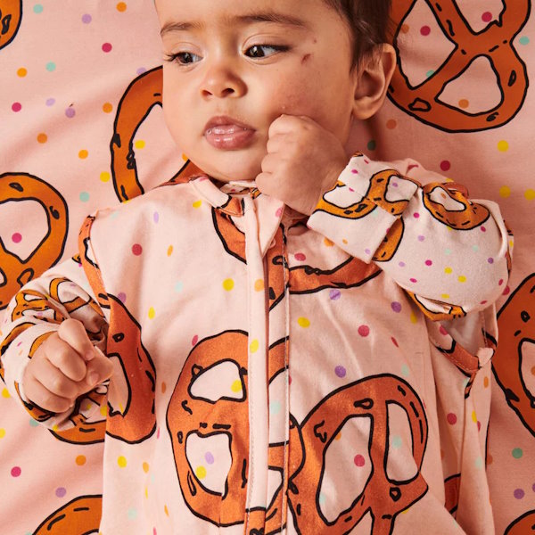 Kip and Co | Pretzels Pink Fitted Cot/Bassinet Sheet at Milk Tooth