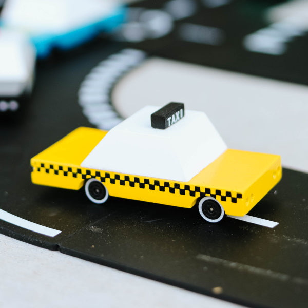 Candylab | Yellow Taxi wooden toy car at Milk Tooth