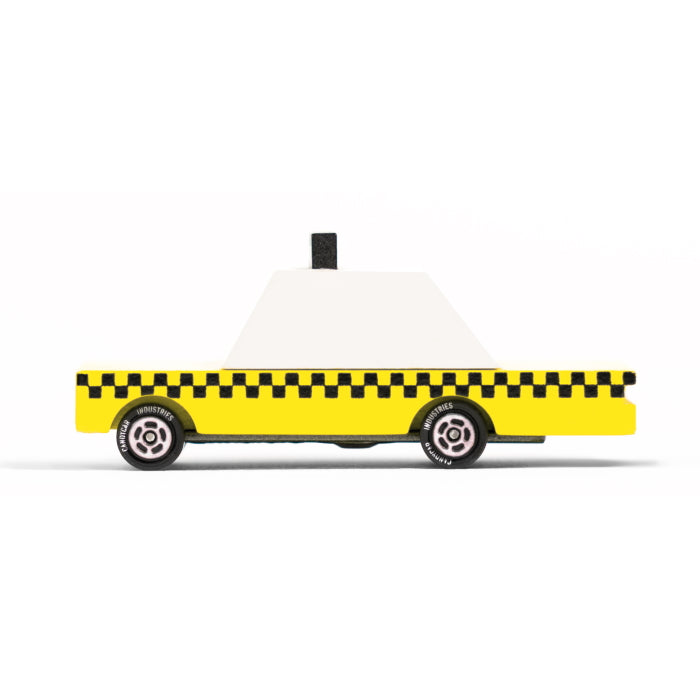 Candylab | Yellow Taxi wooden toy car at Milk Tooth