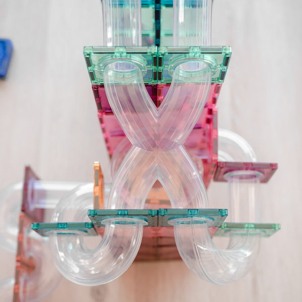 Connetix Tiles | 80 Piece Pastel Ball Run Expansion Pack with x shape tubes at Milk Tooth