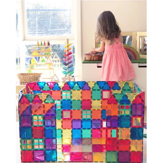 Connetix magnetic building tiles at Milk Tooth wall castle tower house