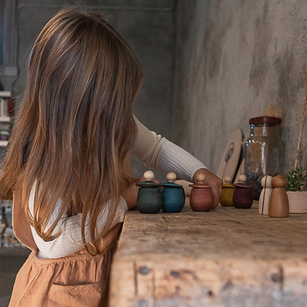 Joguines Grapat | Little Things new 2021 release with girl playing with wooden toys