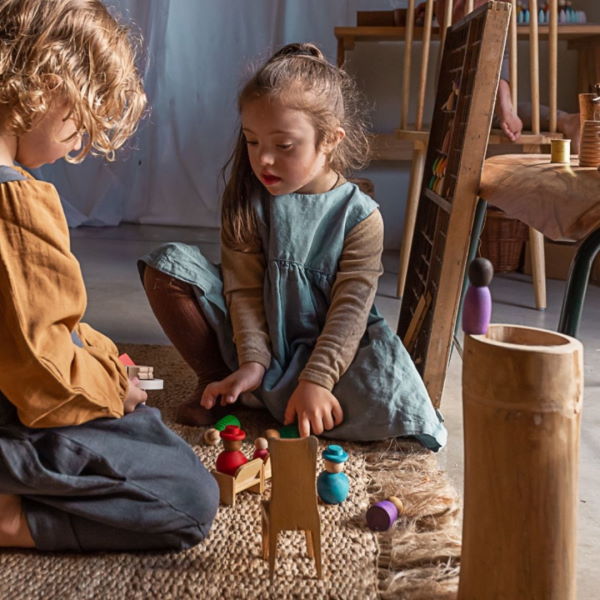 Two children engrossed in play with Grapat Together toys