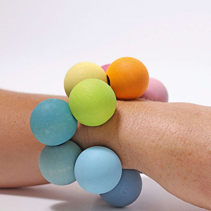 Grimm&#39;s | Bead Grasper | Pastel | Wooden Baby Toy