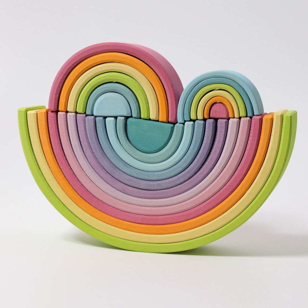 Grimm&#39;s Pastel Rainbow in Small Medium Large wooden stacking toy at Milk Tooth