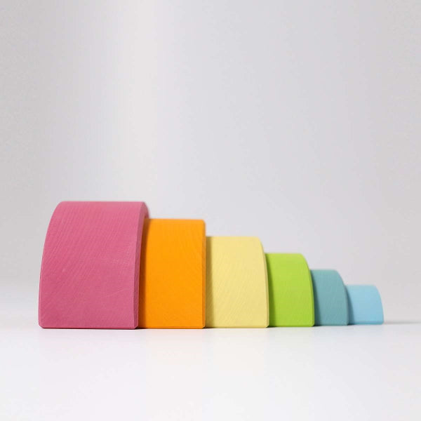 Grimm&#39;s | Medium Rainbow Pastel wooden stacking toy at Milk Tooth