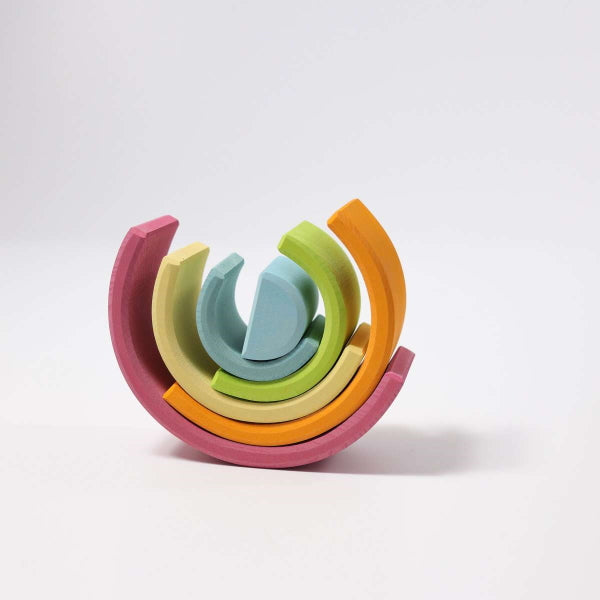 Grimm&#39;s | Medium Rainbow Pastel wooden stacking toy at Milk Tooth