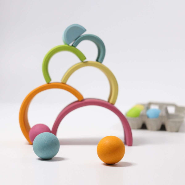 Grimm&#39;s | Medium Rainbow Pastel wooden stacking toy at Milk Tooth