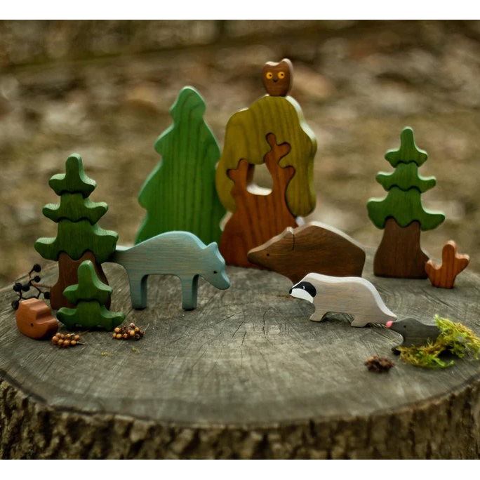 Mikheev forest woodlands small world play scene with wooden animals at Milk Tooth