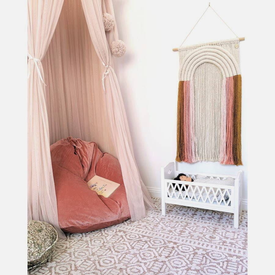 Spinkie Baby Champagne Dreamy Canopy styled in girl&#39;s room with beanbag reading corner nook