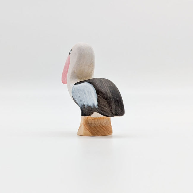 NOM Handcrafted | Pelican Standing at Milk Tooth