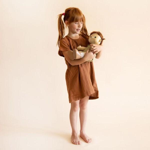 Olli Ella | Dinkum Doll | Pumpkin cradled by girl