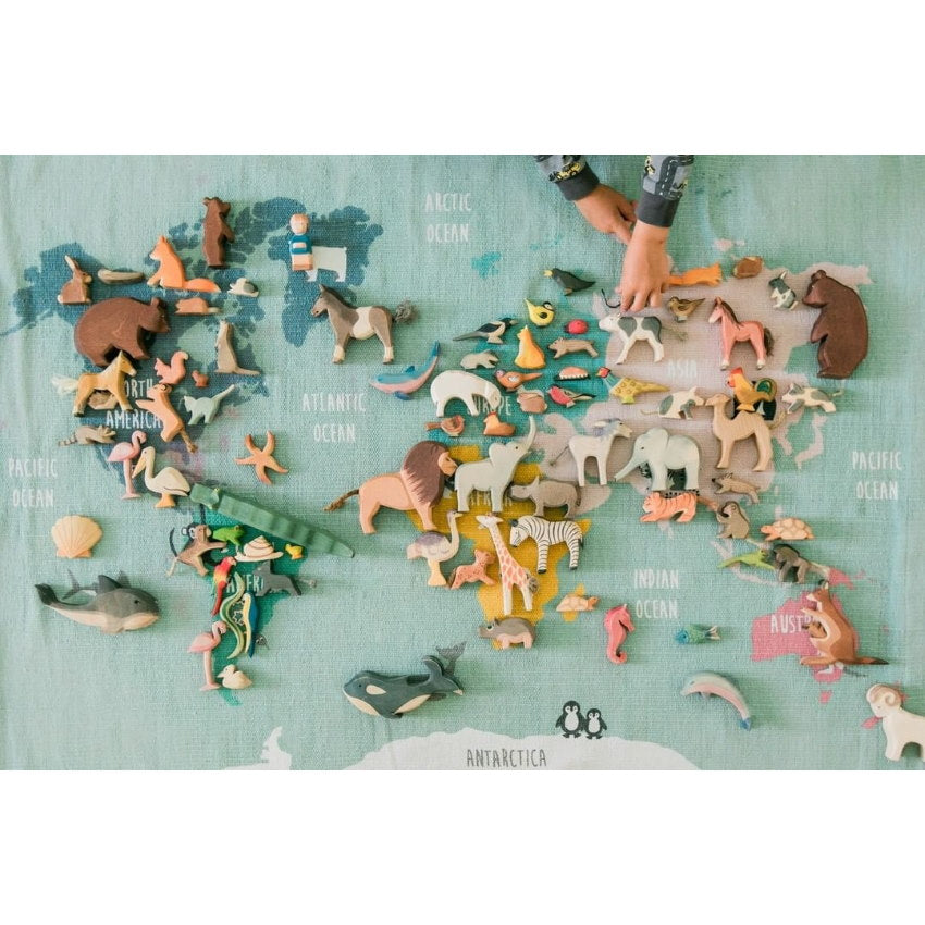 Ostheimer Wooden Toys Animals arranged on World Map | Fox Sitting